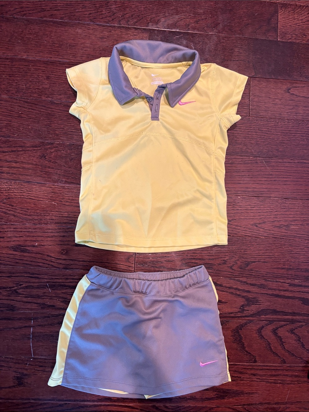 Nike Yellow Polo Top and Gray Skort with Pink Logo